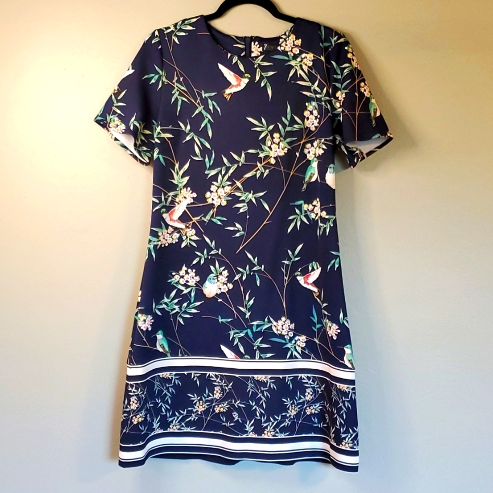 7th Avenue, New York & Company.  Beautiful blue dress with hummingbirds.  Sz med